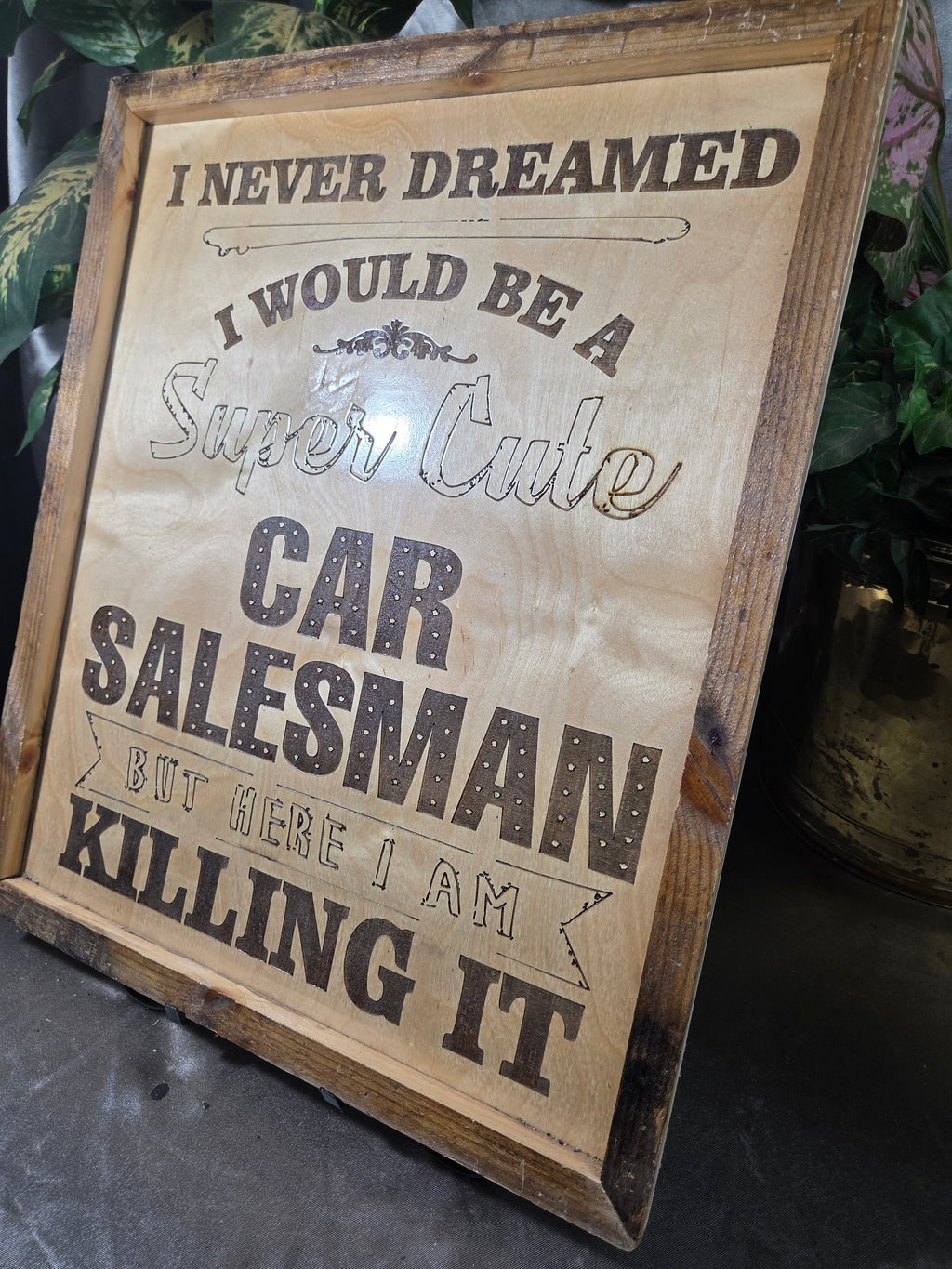Never dreamed you'd be a super cute car salesman? Well… here you are KILLING IT. 😎
This handmade laser-engraved wood sign is the perfect piece for a car salesman’s office, dealership desk, garage, or man cave.
✔ Handcrafted wood frame
✔ Precision laser e